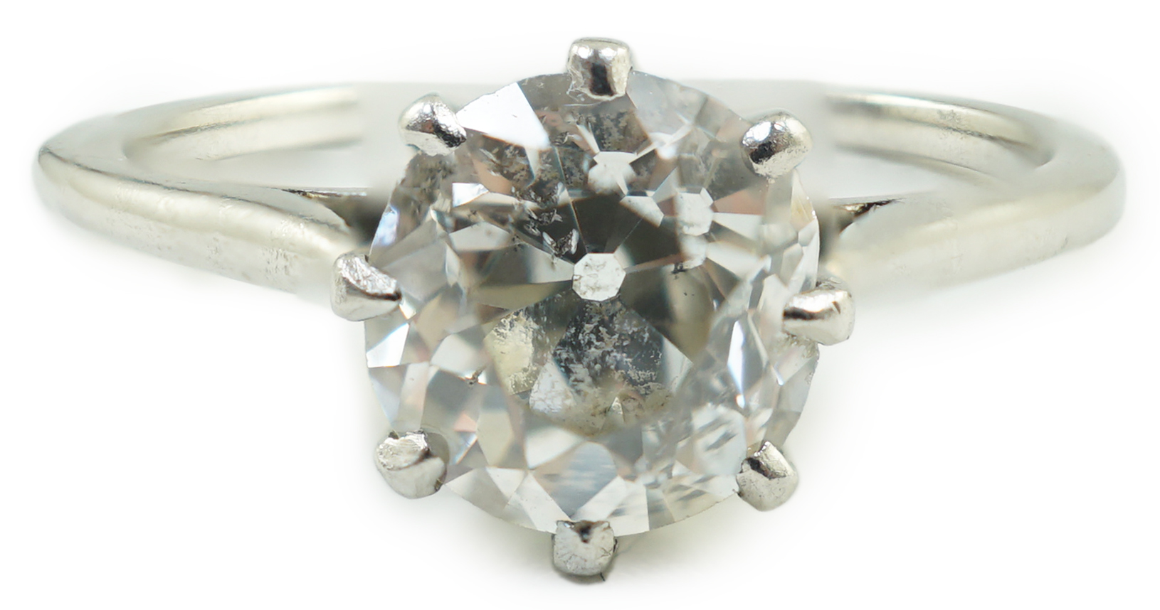 A platinum and solitaire diamond set ring